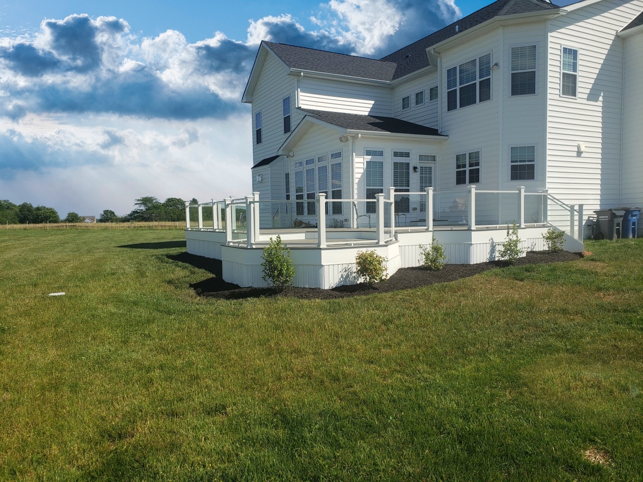 A renovated residential deck in an outdoor living space. | S&S Remodeling