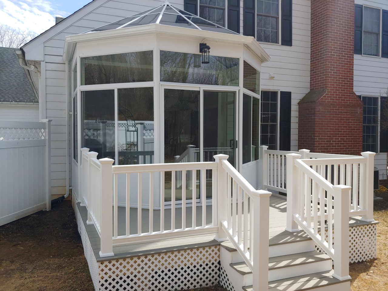 A newly installed deck in a residential outdoor living space. | S&S Remodeling