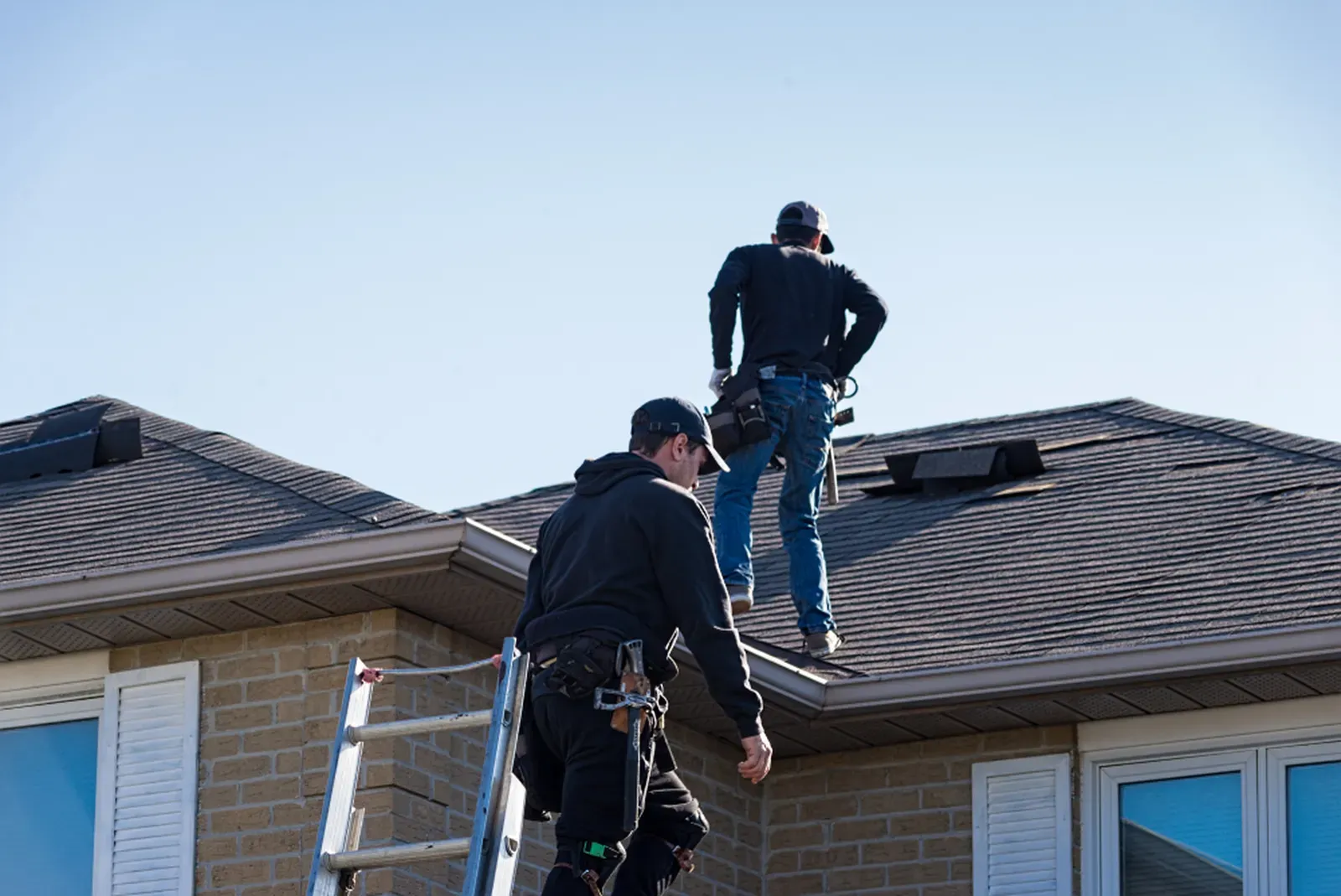 A residential asphalt roof being repaired and hero-approved. | S&S Remodeling