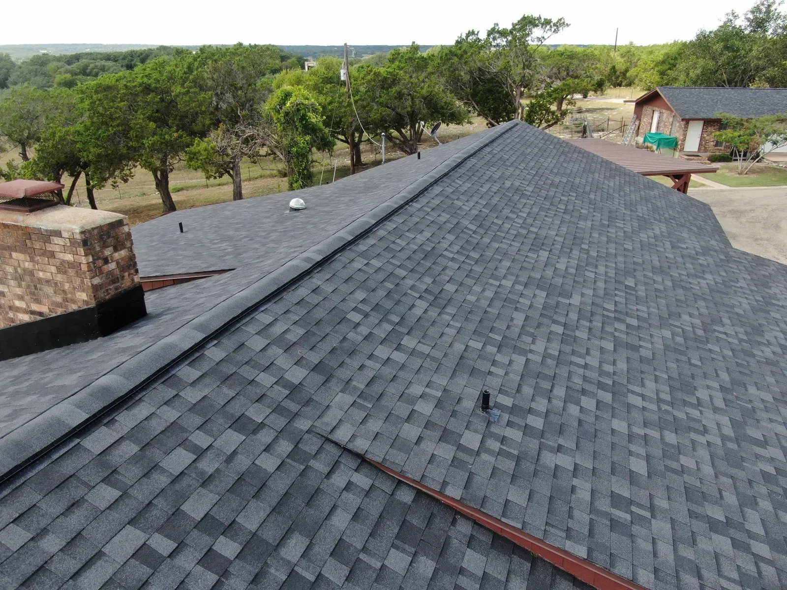 a residential roof replacement due to impact damage | S&S Remodeling