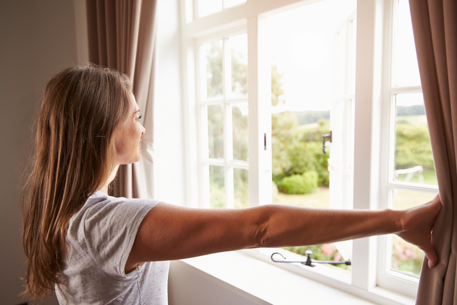 A residential casement window being installed. | S&S Remodeling