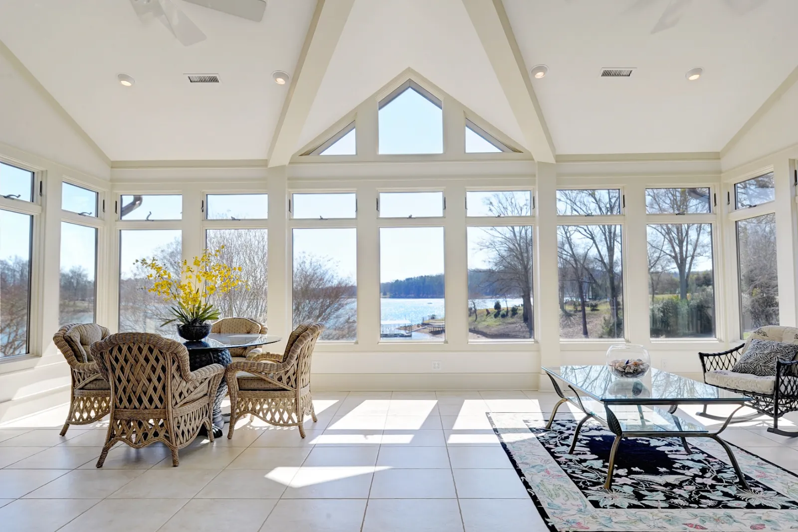 A renovated 4-season sunroom in a residential setting, hero-approved for outdoor living. | S&S Remodeling