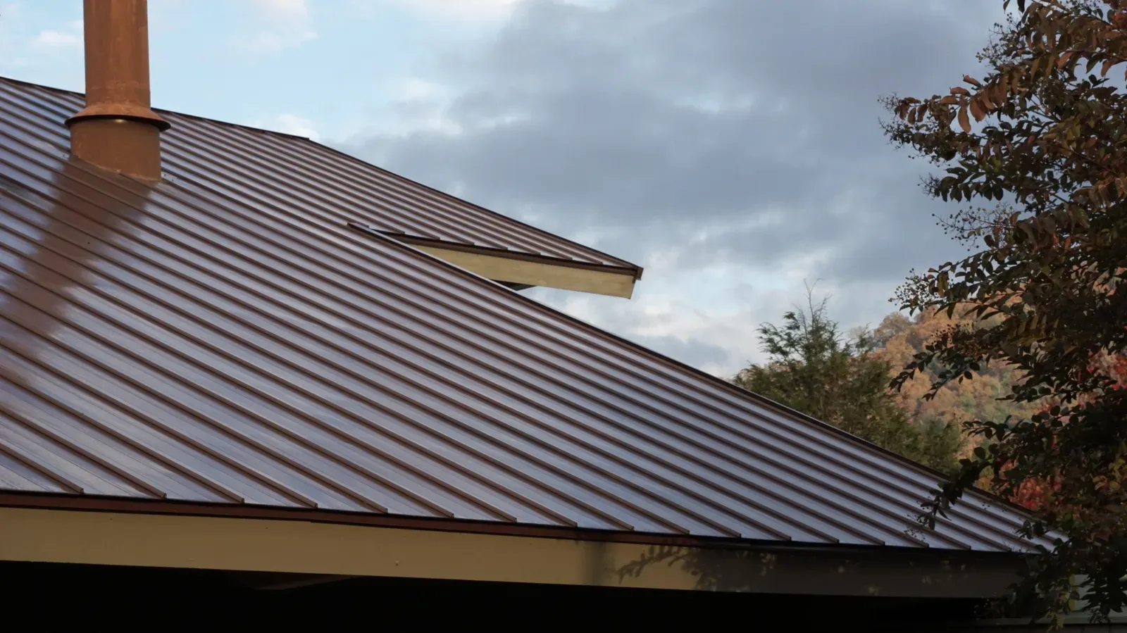 Roof installation of metal on a residential building, hero-approved. | S&S Remodeling